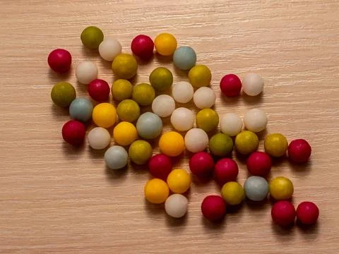 Multicolored sugar dragee. Candy in the form of balls of different colors Stock Photos