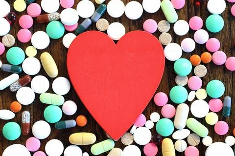 Multicolored tablets of different shapes and sizes Stock Photos
