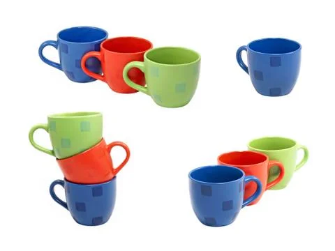 Multicolored tea cups set.isolated. Stock Photos