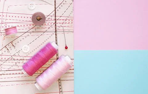 Multicolored thread coils on color background. Sewing supplies, pattern 写真素材