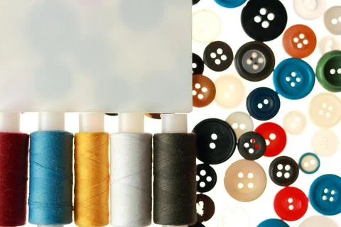 Multicolored threads and buttons for clothes. Stock Photos