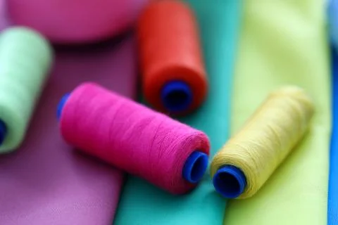 Multicolored threads on coils Stock Photos