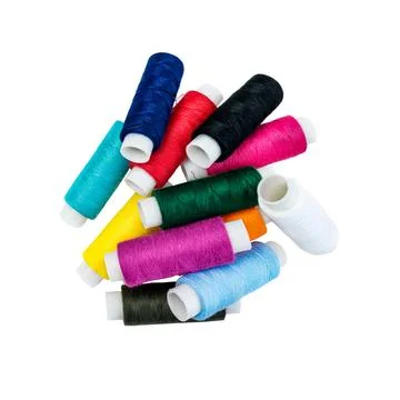 Multicolored threads for sewing on a white background, selective focus Stock Photos