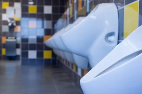 Multicolored Tiled Urinal Stock Photos