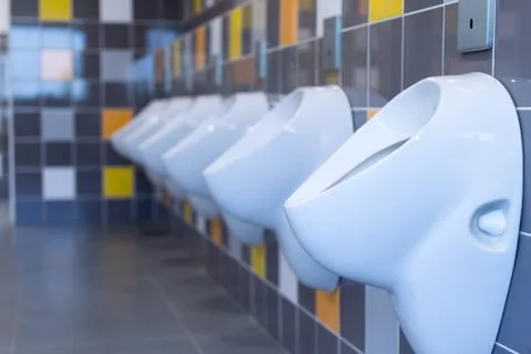 Multicolored Tiled Urinal Stock Photos