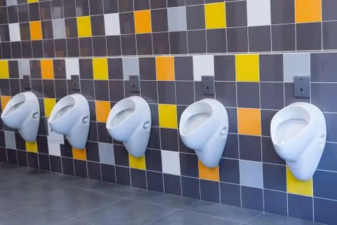Multicolored Tiled Urinal Stock Photos