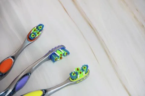 Multicolored toothbrushes for cleaning a teeth Stock Photos