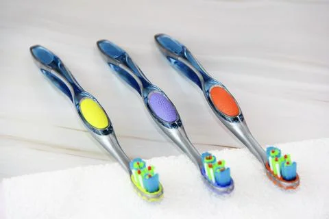 Multicolored toothbrushes for cleaning teeth Stock Photos