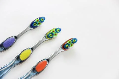 Multicolored toothbrushes for cleaning teeth Stock Photos