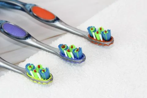 Multicolored toothbrushes for cleaning teeth Stock Photos
