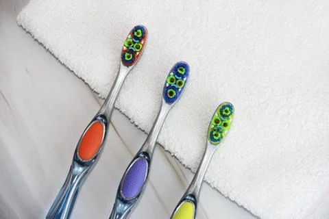 Multicolored toothbrushes for cleaning teeth Stock Photos