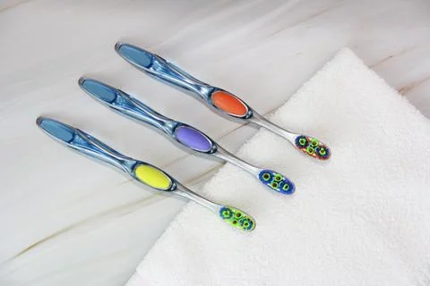 Multicolored toothbrushes for cleaning teeth Stock Photos