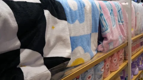 Multicolored towels hanging in a row. Beautiful towels in different colors. Stock Footage 295521853