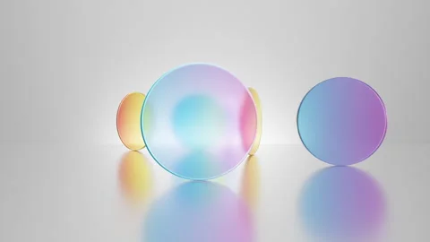 Multicolored translucent round glass blocks spin and rotate Stock Footage 255520805