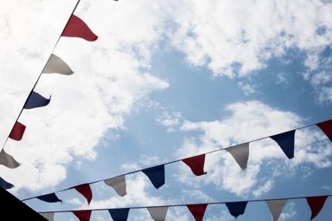 Multicolored Triangular Flags Hanging in the Sky at an Outdoor. Garland of br Stock Photos
