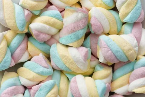 Multicolored twisted marshmallows Stock Photos