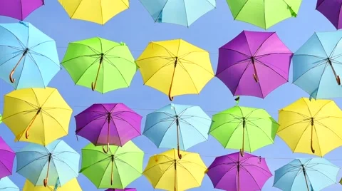 Multicolored umbrellas background. Colorful umbrellas urban street decoration. Stock Footage 59090408