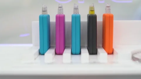 Multicolored vapes in a row Stock Footage 112446081