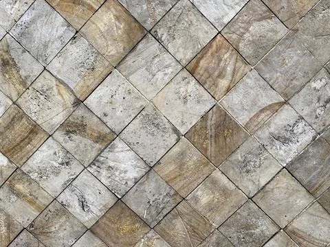 Multicolored wall square tile pattern with rough texture Stock Photos