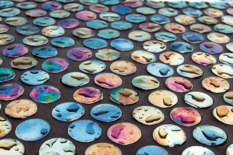 Multicolored wet circles background Stock Photos