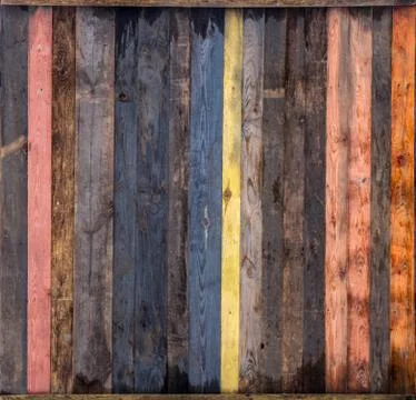 Multicolored wooden background with a wide range of saturated colors. Stock Photos