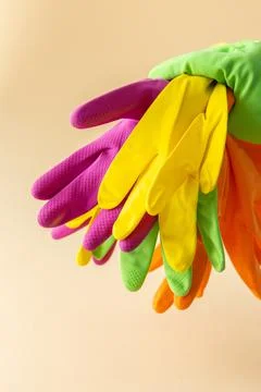 Multicolored working rubber gloves Stock Photos