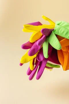 Multicolored working rubber gloves Stock Photos