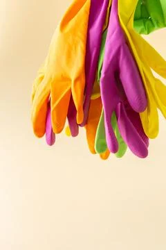 Multicolored working rubber gloves Stock Photos
