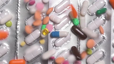 Multicolour pills spinning 스톡 동영상 168639580