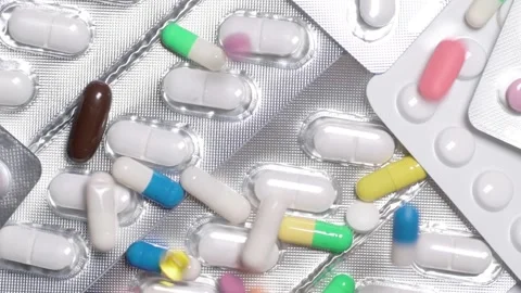 Multicolour pills spinning Video stock 168639685