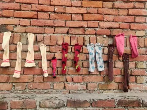 Multicolour Socks hanging on wall , Socks drying on the wall , 스톡 사진