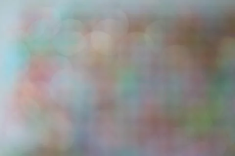 Multicoloured abstract background with soft glowing circles of pale light Stock Photos
