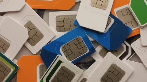 Multicoloured anonymous SIM cards spinning. DSCN9195 Stock Footage 254768243