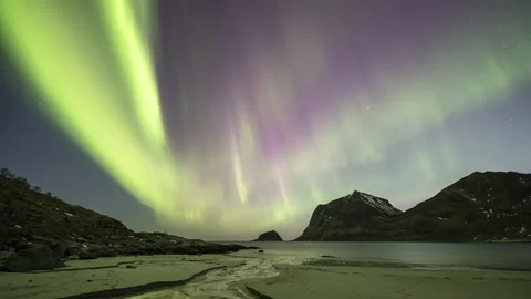 Multicoloured Aurora Borealis over beach Stock Footage 251362620