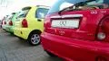 Multicoloured cars Chery QQ at motor show HD Footage