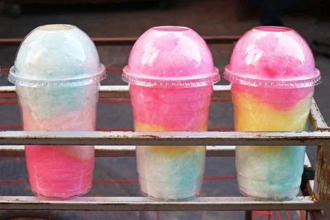 Multicoloured Cotton Candy in Plastic Cups at the City Festival Stock Photos