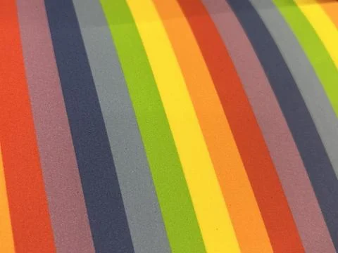 Multicoloured fabric vertical strips, red, orange, yellow, green, blue Stock Photos