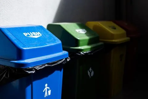 Multicoloured Garbage Trash Bins Stock Photos