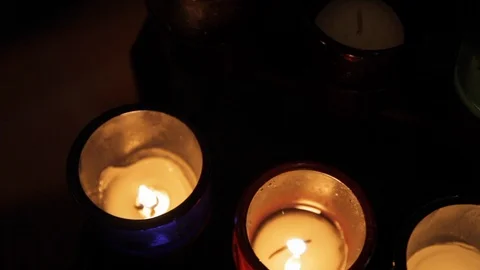 Multicoloured Glass Light Up Candles Stock Footage 112953167