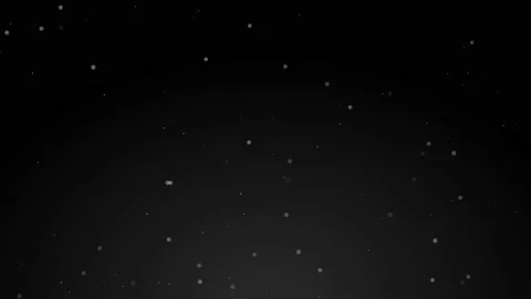 Multicoloured particles of suspended matter fly against a dark background. Stock Footage 235815380