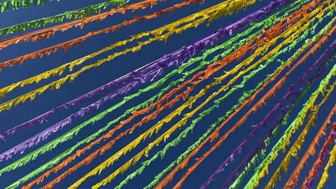 Multicoloured ribbons decorating the street in front of the blue sky. 4K Stock Footage 196981388