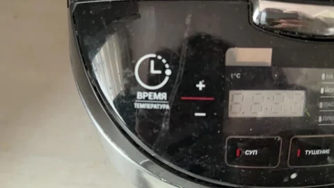 Multicooker switching modes on digital display close up at home, changing Stock Footage 337104794