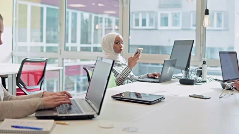 Multicultural business partners teamwork ini coworking startup office Stock Footage 166344848