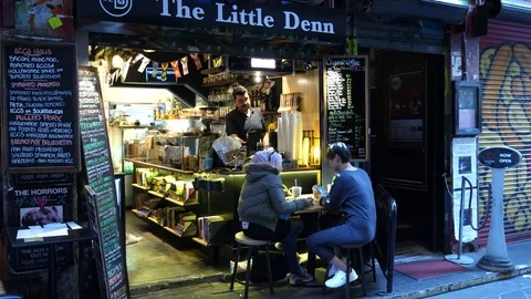 Multicultural Cafe on the Streets Stock Footage 81690737