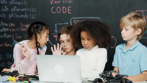 Multicultural children using laptop programing engineering code. Erudition. Video stock 273464761