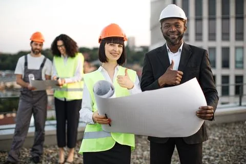 Multicultural developers controlling building quality 写真素材