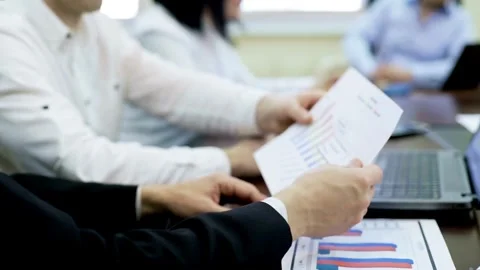 Multicultural employees group work together on project paperwork, Diverse Video stock 256742014