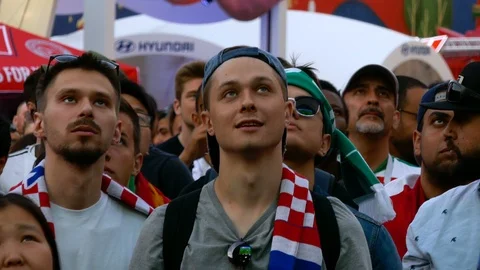 Multicultural fans from all over the world with different ethnicity watching Video stock 91634846