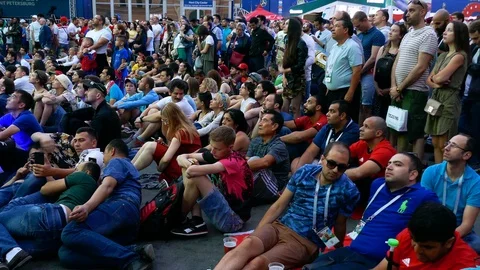 Multicultural fans from all over the world with different ethnicity watching Stock Footage 91635053