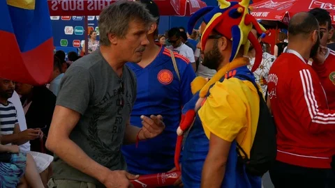 Multicultural fans from all the world different ethnicity talking shaking hands Stock Footage 91633953